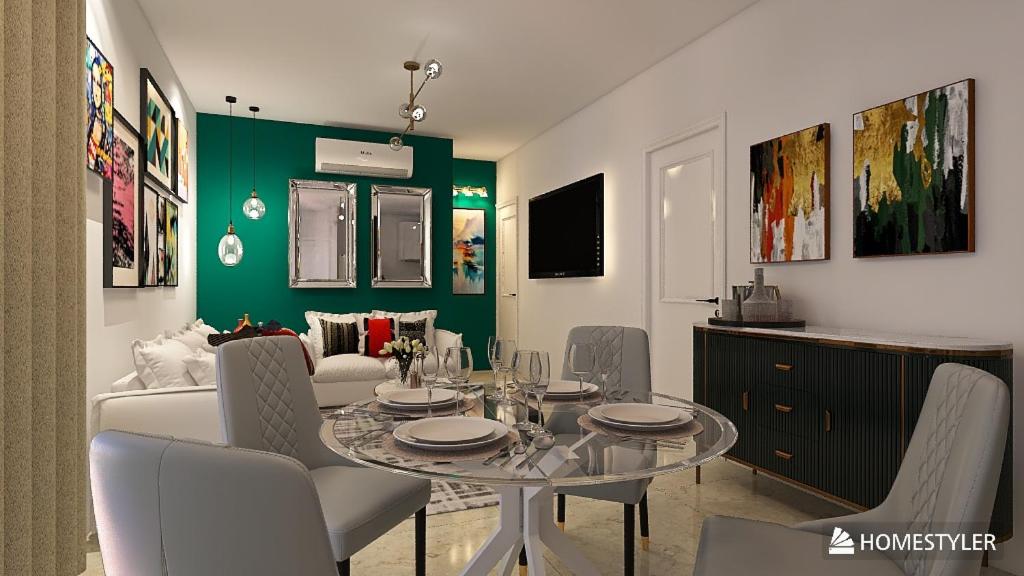 a living room with a table and a couch at Apartamento San Andrés 
