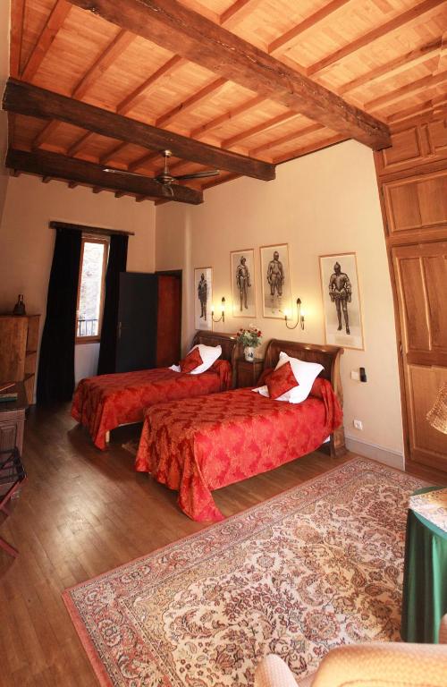Postel nebo postele na pokoji v ubytování L'Ancienne Auberge