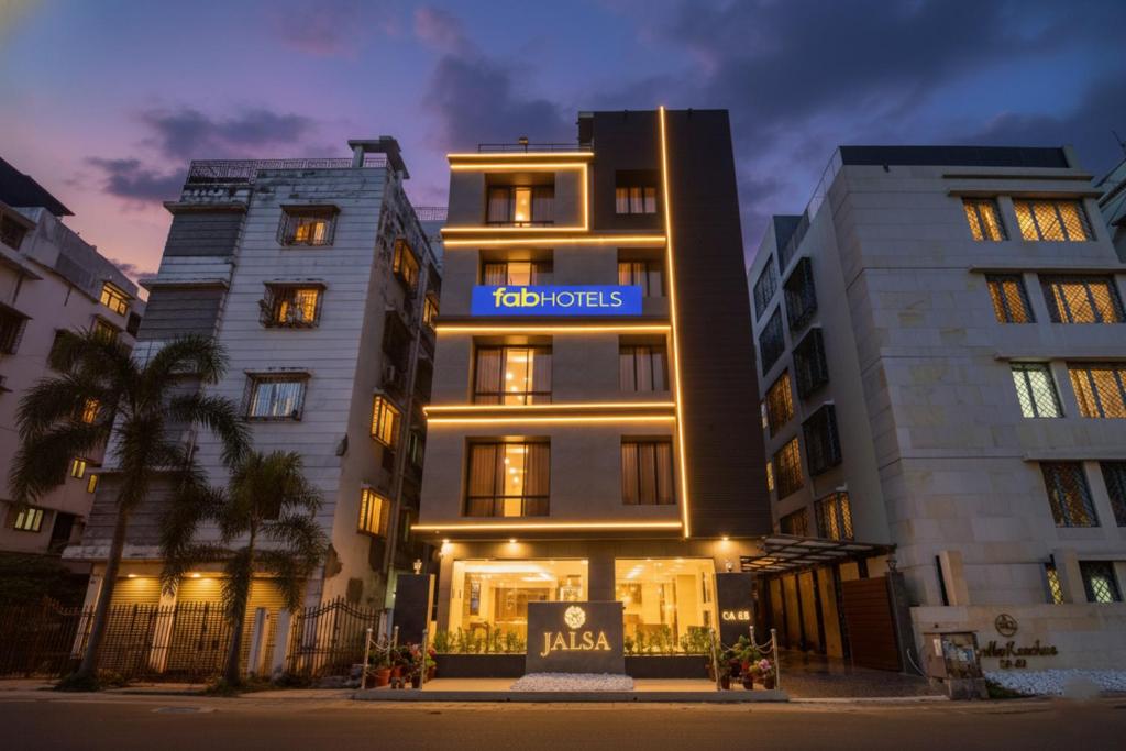 a building with a sign that reads ko hotels at FabHotel Prime Jalsa - Nr Axis Mall in Kolkata