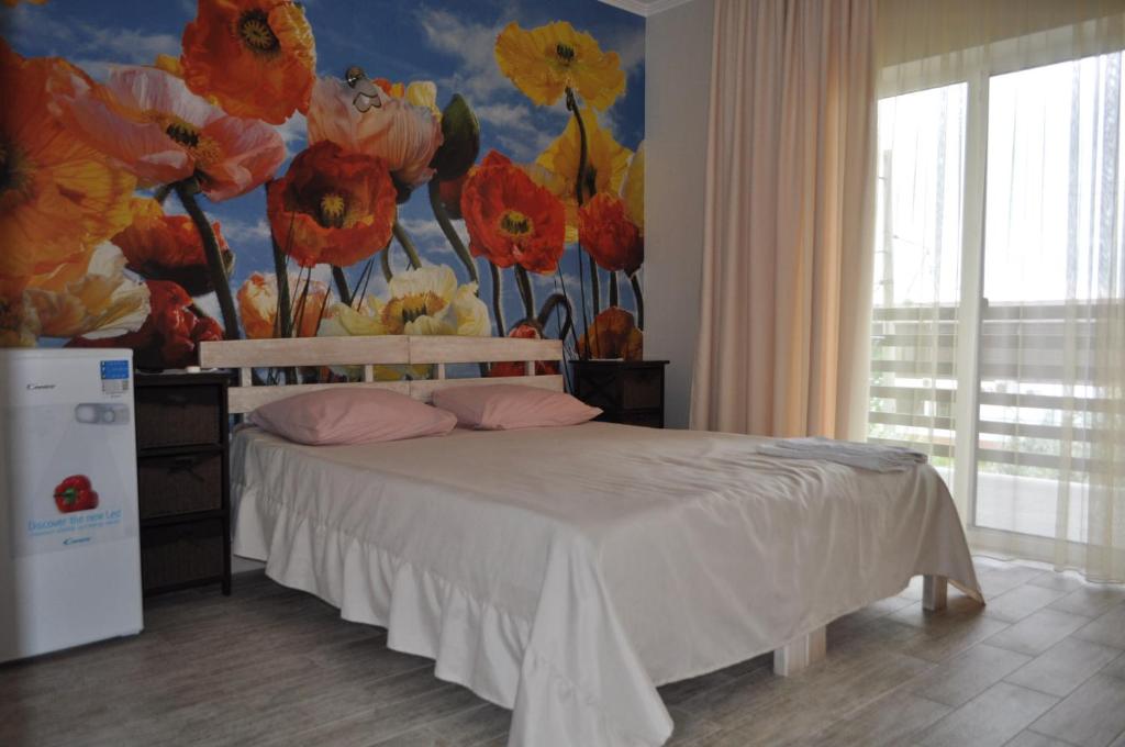 Postel nebo postele na pokoji v ubytování Inn Estio