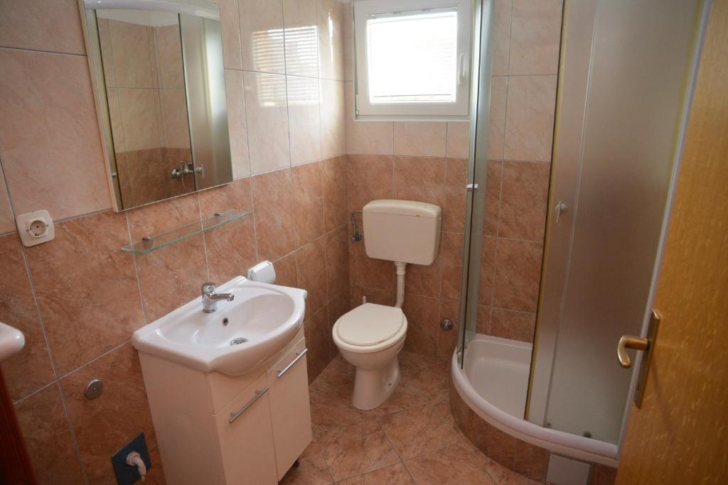 Kúpeľňa v ubytovaní Apartments Salamun