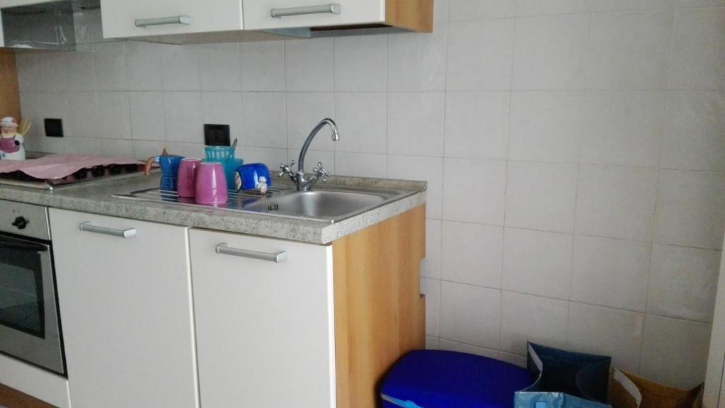 Kuchyň nebo kuchyňský kout v ubytování Emi Apartment