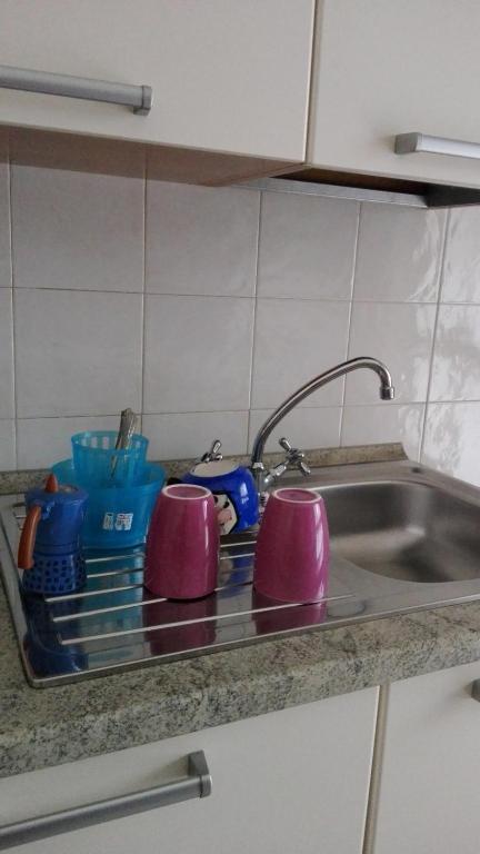 Kuchyň nebo kuchyňský kout v ubytování Emi Apartment