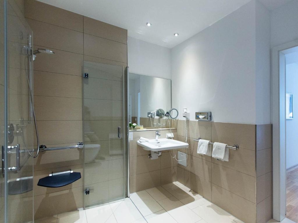 Koupelna v ubytování Hotel Seepark Garni