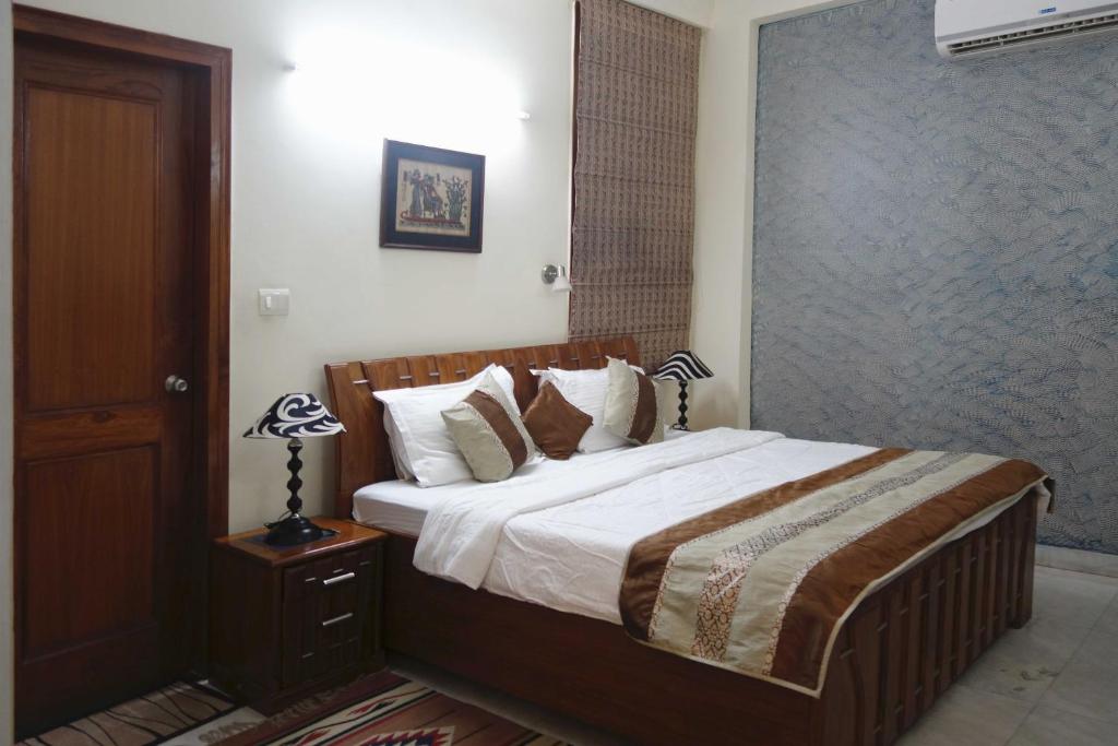 Postel nebo postele na pokoji v ubytování SABS Bed and Breakfast