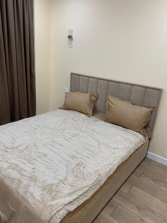 Postel nebo postele na pokoji v ubytování Лазурный квартал