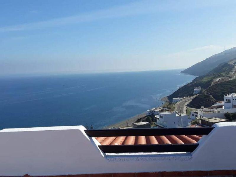 a view of the ocean from the roof of a building at Villa The View in Tétouan
