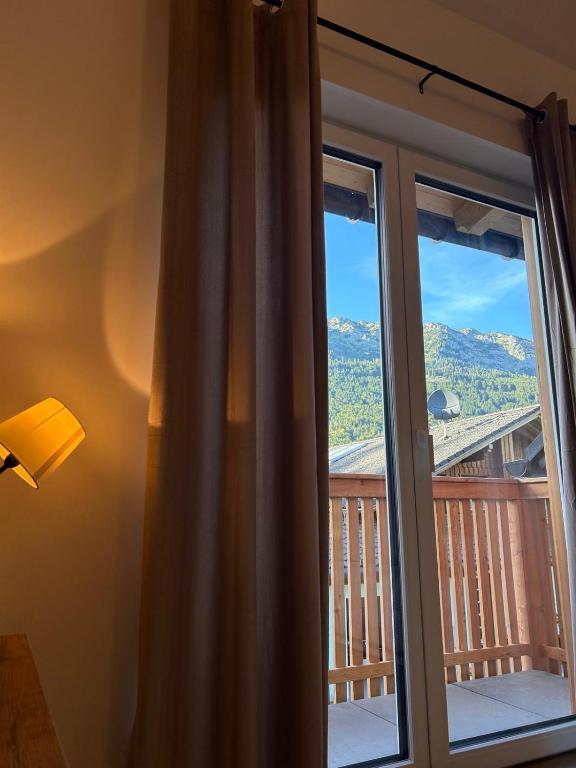 a window with a view of a mountain view at Panorama Loft Bad Aussee in Bad Aussee