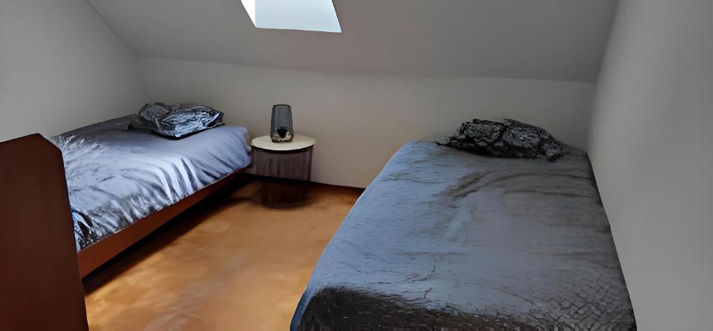 Postel nebo postele na pokoji v ubytování Domaine De L'olympe