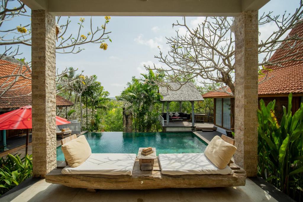 Bazén v ubytování Villa Uma Priyayi nebo v jeho okolí