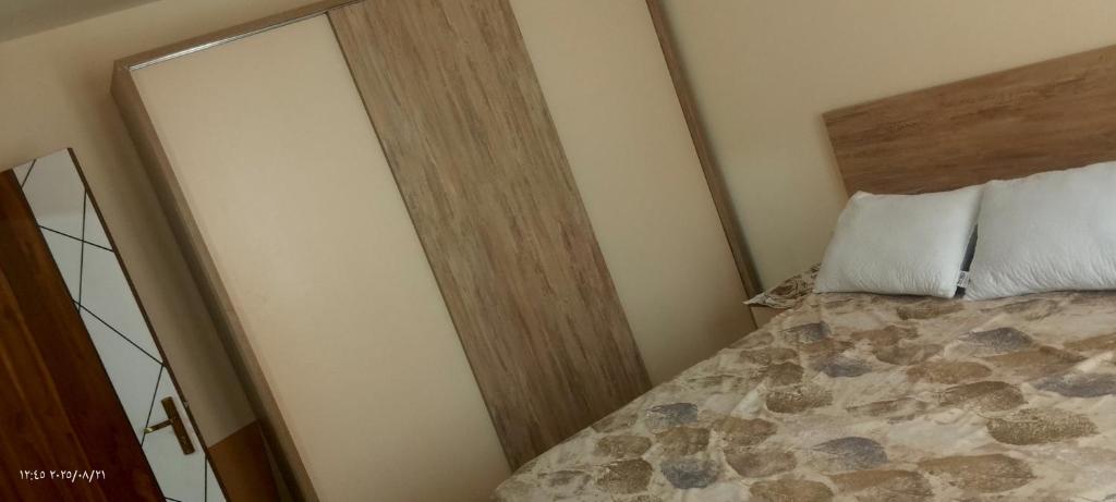 Ένα ή περισσότερα κρεβάτια σε δωμάτιο στο جولدن طيبه الذهبيه