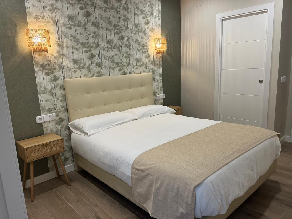 Postel nebo postele na pokoji v ubytování El Helecho de Gredos