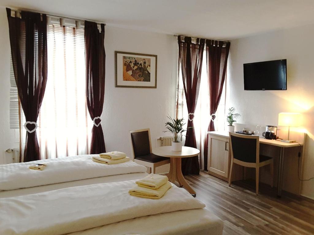Postel nebo postele na pokoji v ubytování Hotel Gasthaus Papen Änne