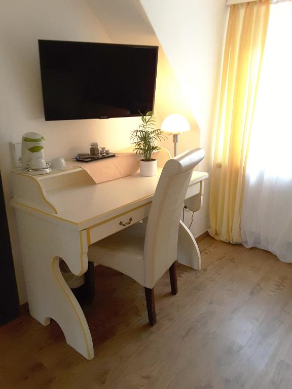 TV a/nebo společenská místnost v ubytování Hotel Gasthaus Papen Änne