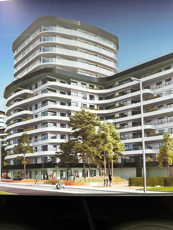 a rendering of a large apartment building at Spacious and modern apartment with open sea view in Ostend
