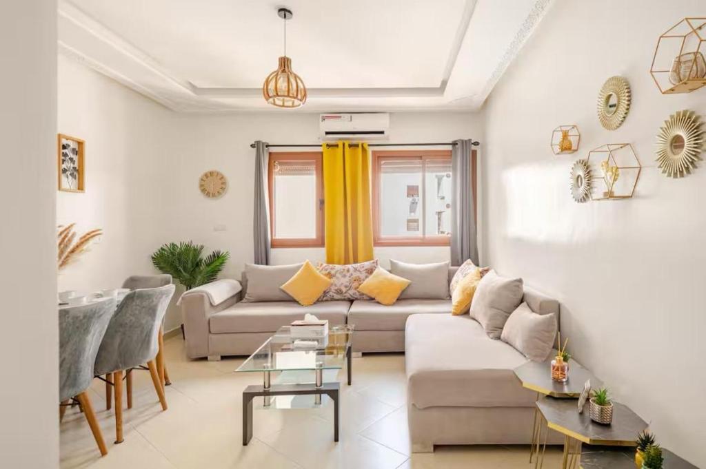 Posezení v ubytování Appartement Haut Standing front de mer Malabata