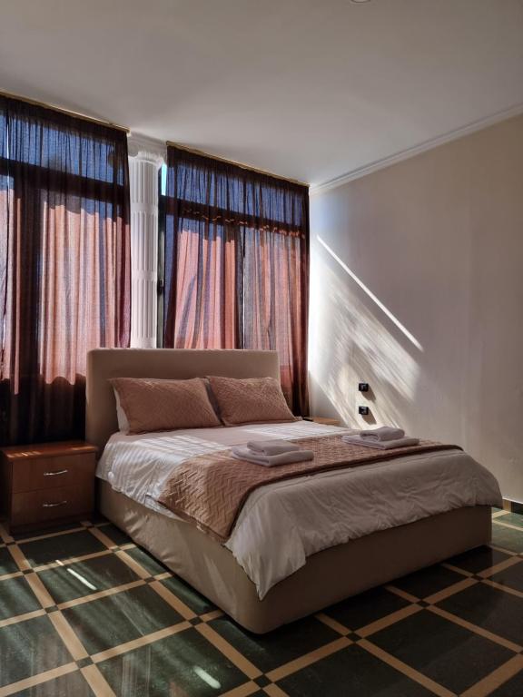 Una cama o camas en una habitación de Hotel Vienna