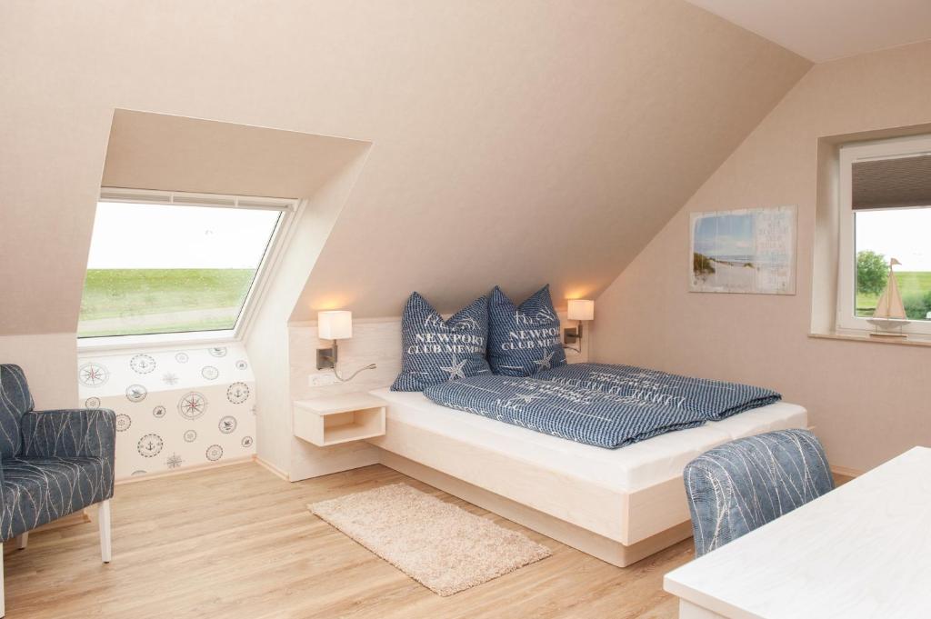 Un pat sau paturi într-o cameră la Hotel HaWattn