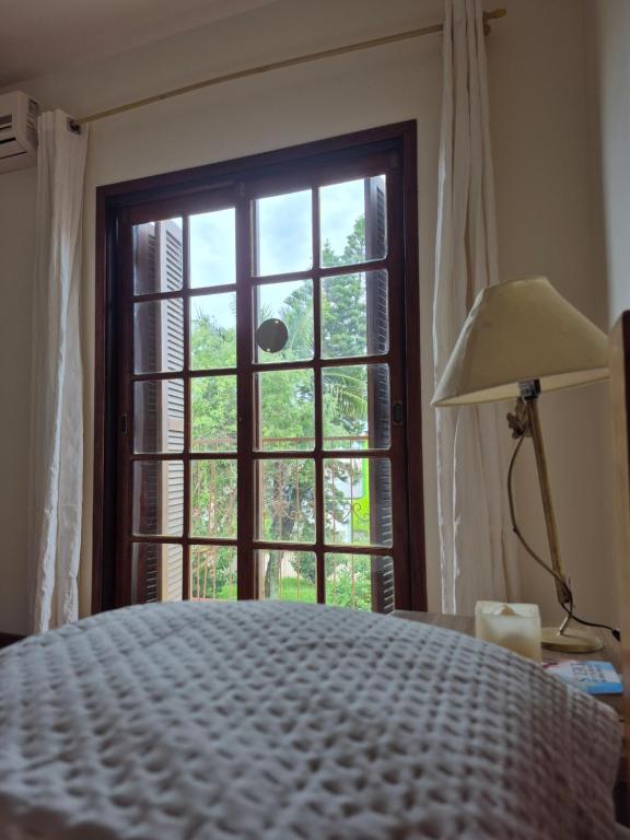 Postel nebo postele na pokoji v ubytování Pousada Vivenda