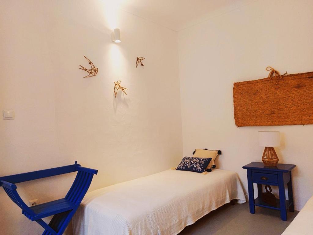 Postel nebo postele na pokoji v ubytování Moradia com Piscina Casa Mourisca Alqueva
