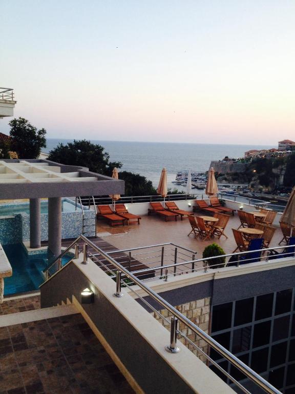 a view of the ocean from the balcony of a hotel at Apartments Croma in Ulcinj