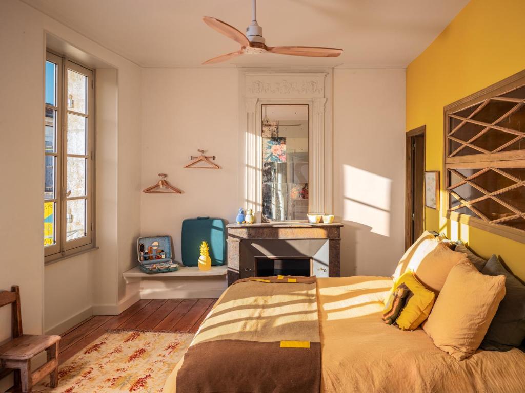 Ένα ή περισσότερα κρεβάτια σε δωμάτιο στο A la maison en medoc