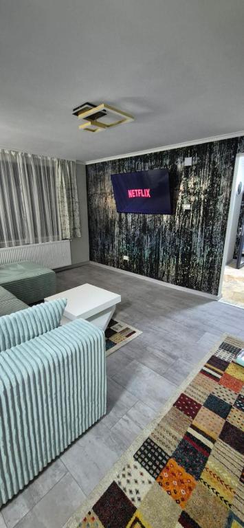 Ένα ή περισσότερα κρεβάτια σε δωμάτιο στο Safta Apartaments Center