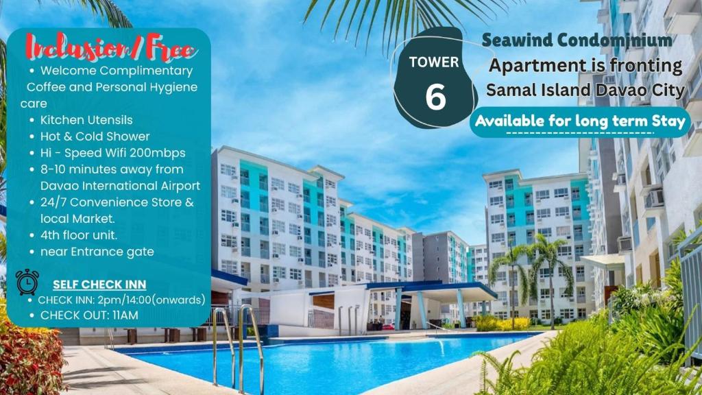 a sign for a resort with a swimming pool at 4th- Sea View of Seawind Condominium in Davao City