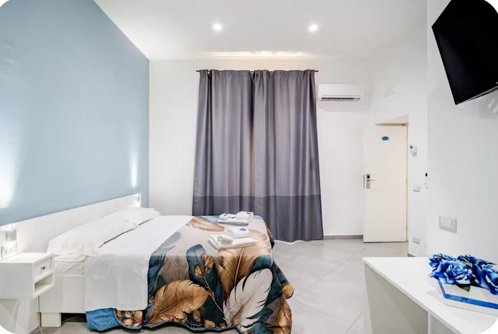 Ένα ή περισσότερα κρεβάτια σε δωμάτιο στο Duomo 34 Guest Room