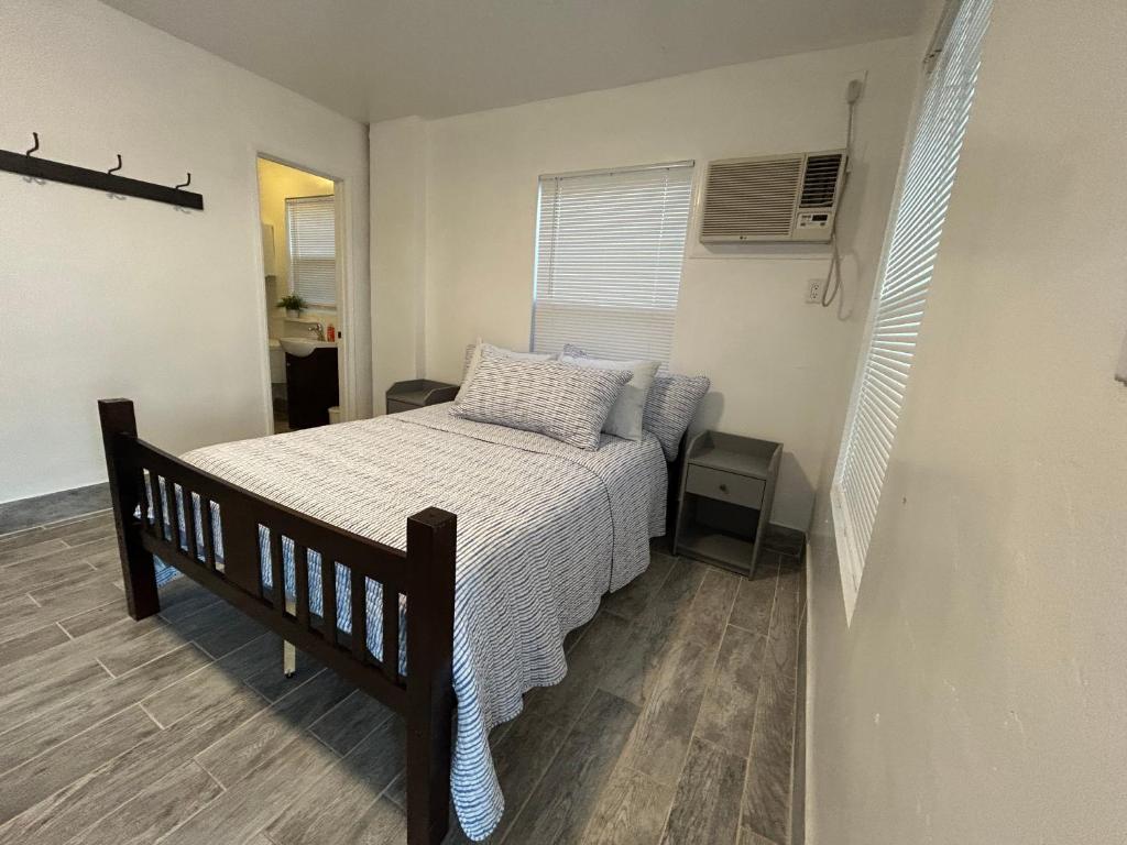 a small bedroom with a bed and a window at Perfect Place for vacation ! in Wofford Heights