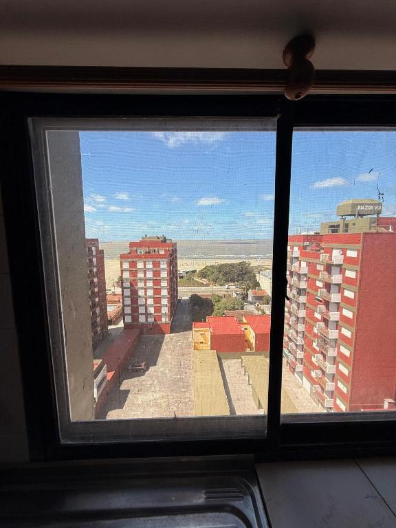 a view of a city from a window at San Jorge in San Clemente del Tuyú