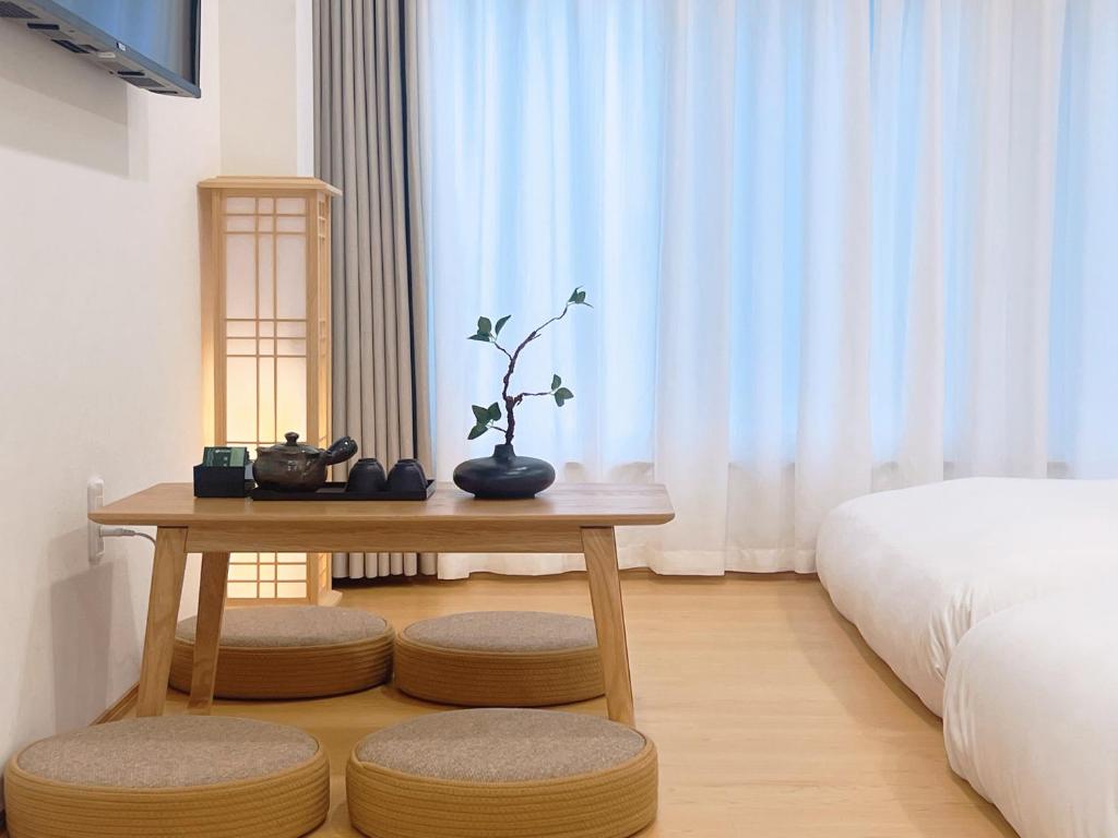 Ένα ή περισσότερα κρεβάτια σε δωμάτιο στο star house akihabara ueno tokyo