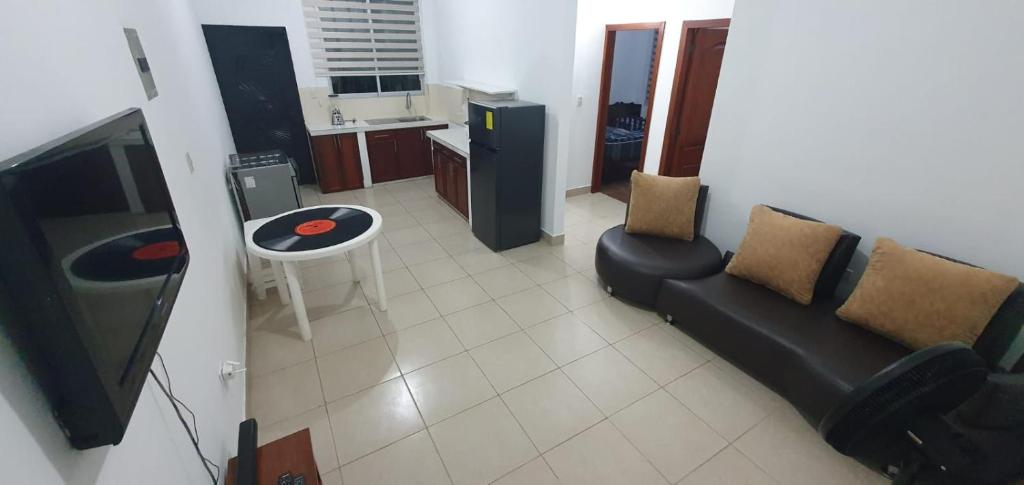 TV a/nebo společenská místnost v ubytování Macas Comfort Apartment