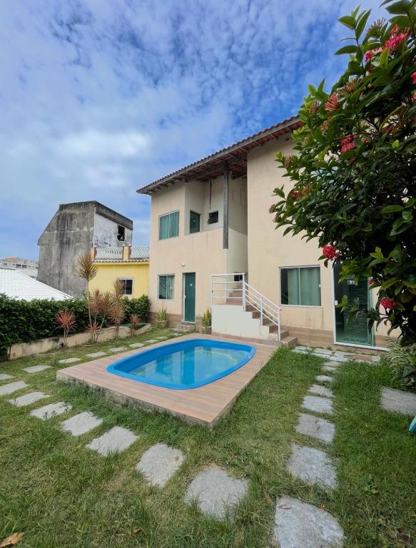 Bazén v ubytování Suítes Pé na Areia Arraial do Cabo nebo v jeho okolí