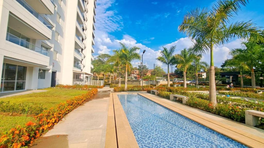 Πισίνα στο ή κοντά στο Agradable y confortable apto vacacional en Santa Fé de Antioquia-Colombia dentro de condominio con piscina, tobogán, zonas recreativas, jardines y espectacular vista