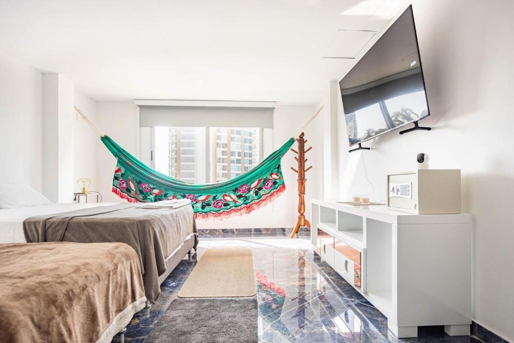 Μια τηλεόραση ή/και κέντρο ψυχαγωγίας στο Casa Eloisa I-Cozzy and quiet Playa Salguero