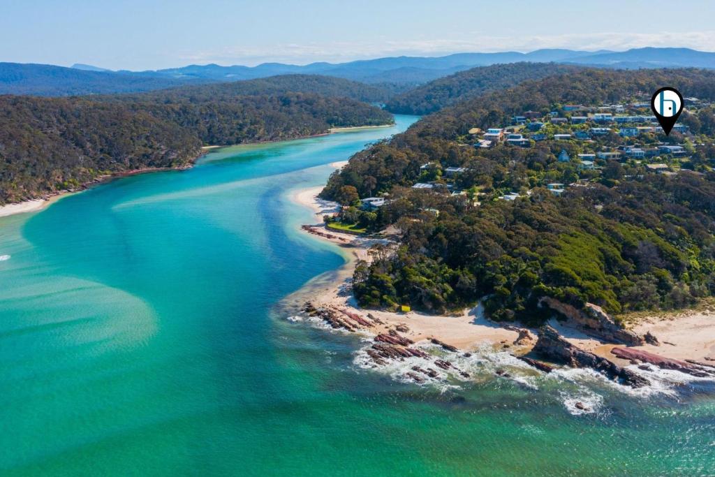 an aerial view of an island in the water at 15 Weemilah Drive Pambula Beach in Pambula Beach
