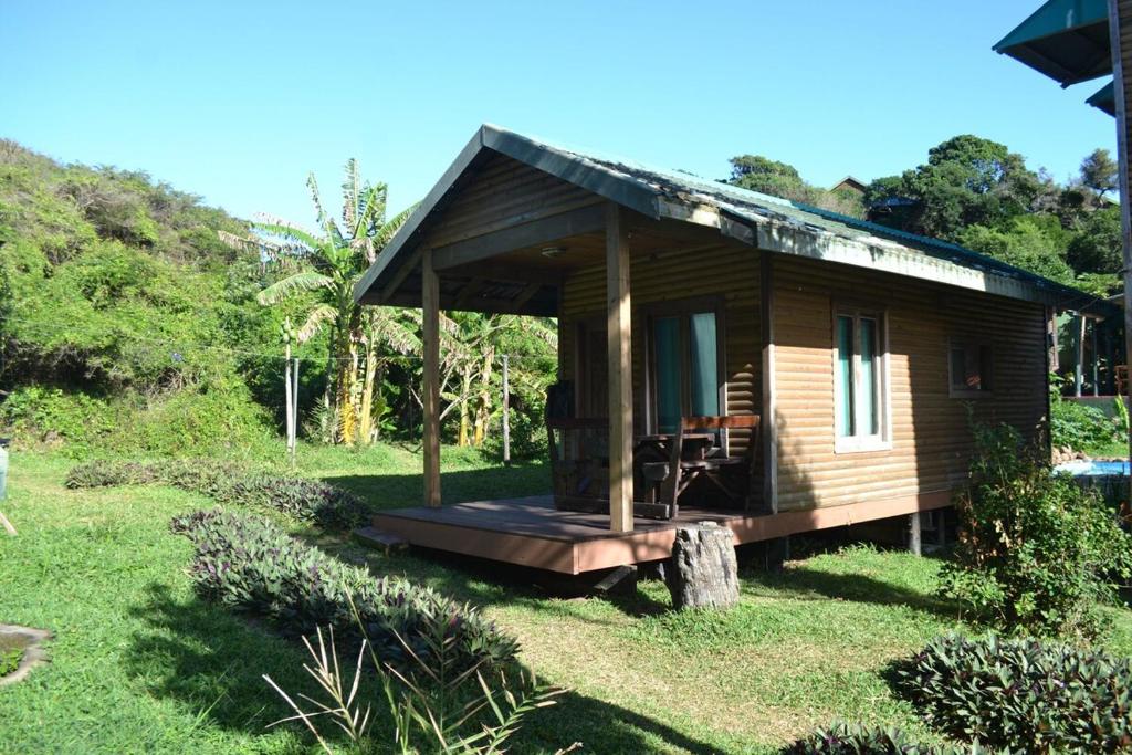 Κήπος έξω από το Onda Azul Family Unit