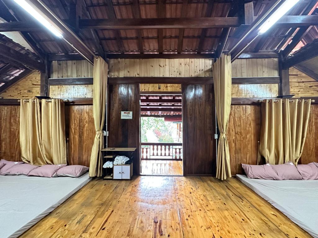 Postel nebo postele na pokoji v ubytování Nà Bó Homestay