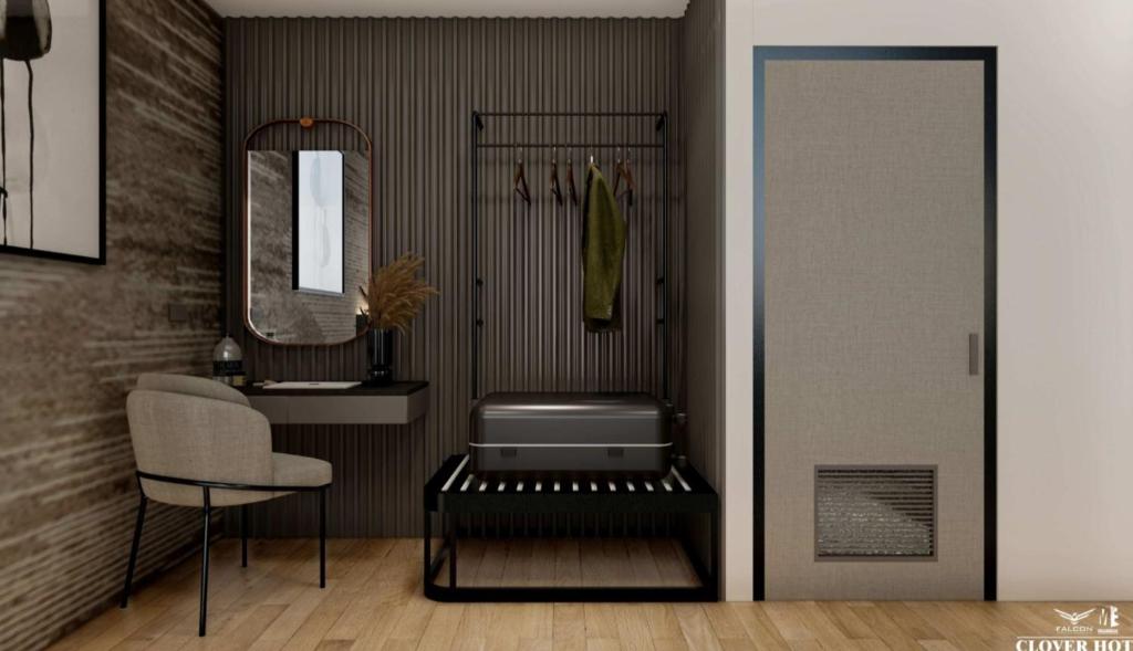 清迈The Clover的一间带椅子、镜子和椅子的房间