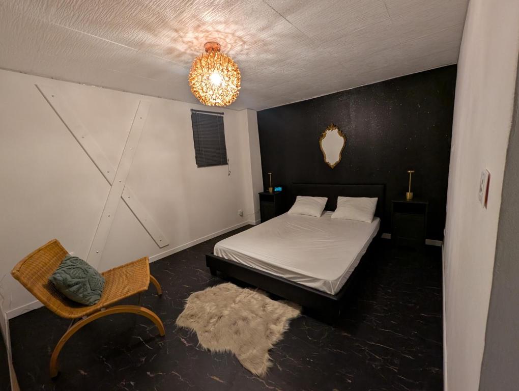 Postel nebo postele na pokoji v ubytování Sur la route du champagne