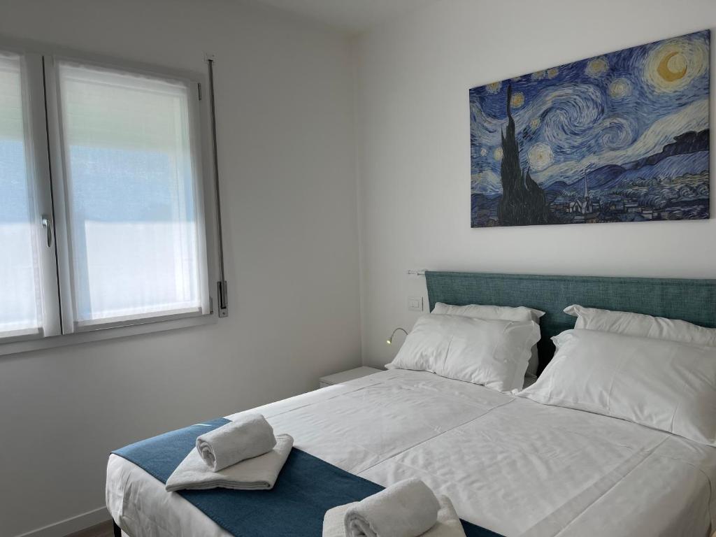 Postel nebo postele na pokoji v ubytování Campodarsego Central Apartment