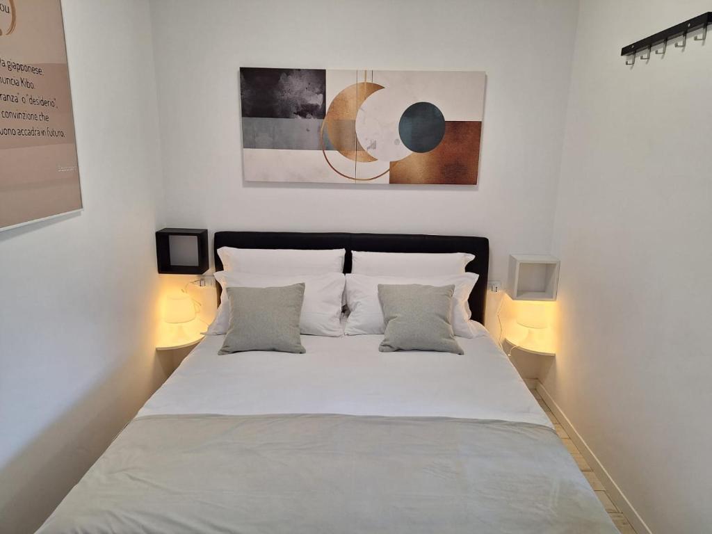 Ένα ή περισσότερα κρεβάτια σε δωμάτιο στο Kibou Apartment by Quokka 360 - Half an hour from the centre of Milan