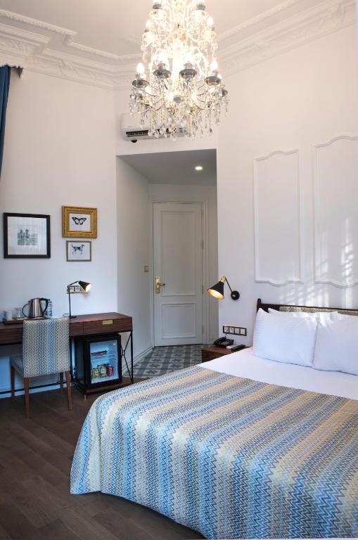 Postel nebo postele na pokoji v ubytování Rodosto Hotel