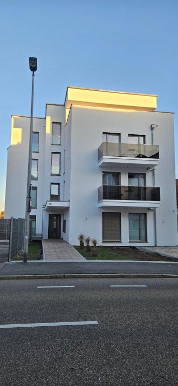 a white building on the side of a street at Ludwig 2 in Freudenstadt