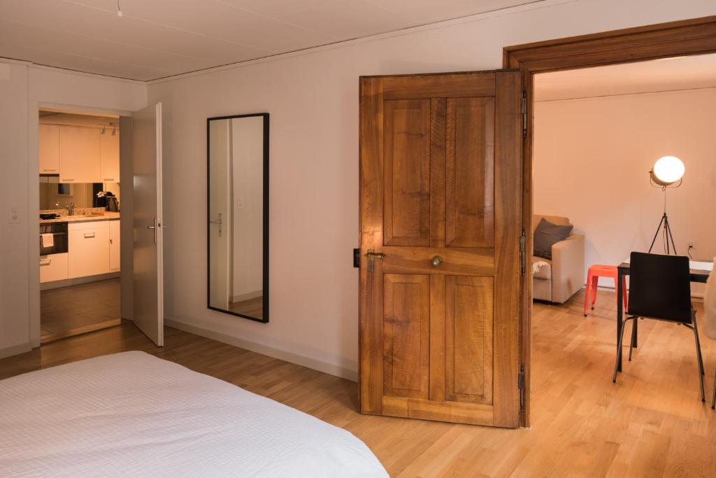 Kuchyň nebo kuchyňský kout v ubytování Stylish Apartment in the Heart of Zug by Airhome