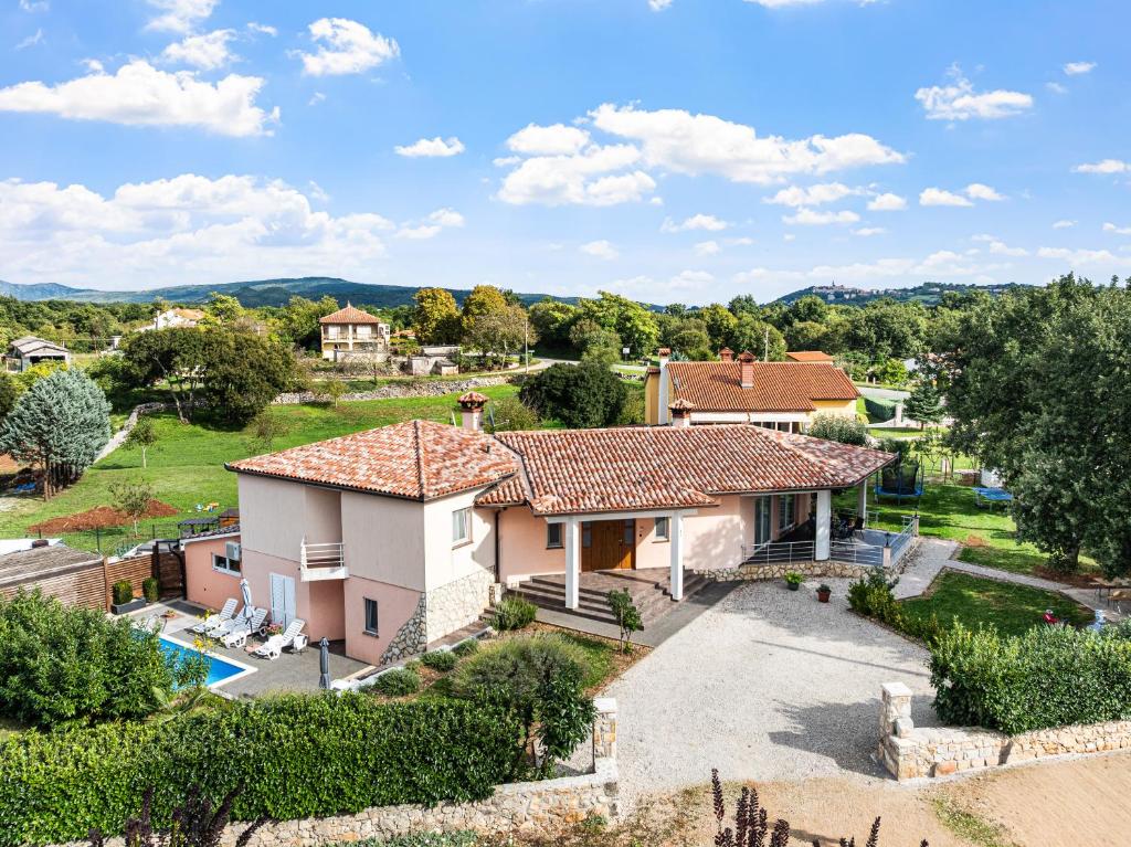 an aerial view of a house with a pool at Home DiE Paradise in Labin