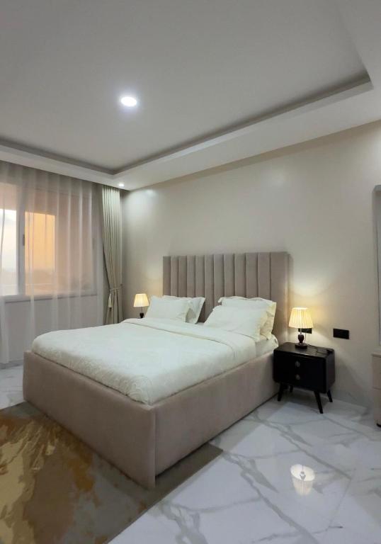 Postel nebo postele na pokoji v ubytování Maison Kololo