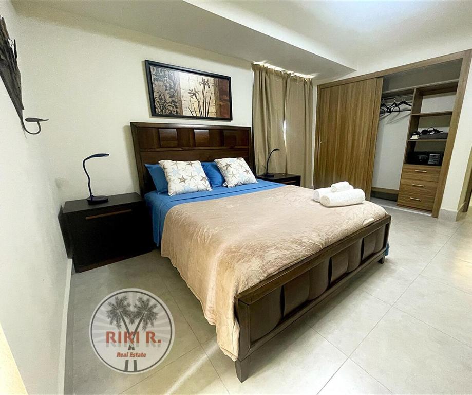 Ένα ή περισσότερα κρεβάτια σε δωμάτιο στο RIKI R Boca del Mar III Apartment 406