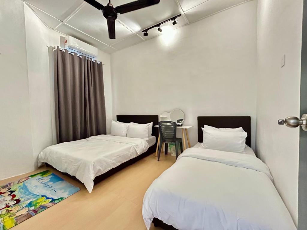 Krevet ili kreveti u jedinici u okviru objekta Cozyindah11A#7pax#netflix#NearAeonAlma#BukitMertajam
